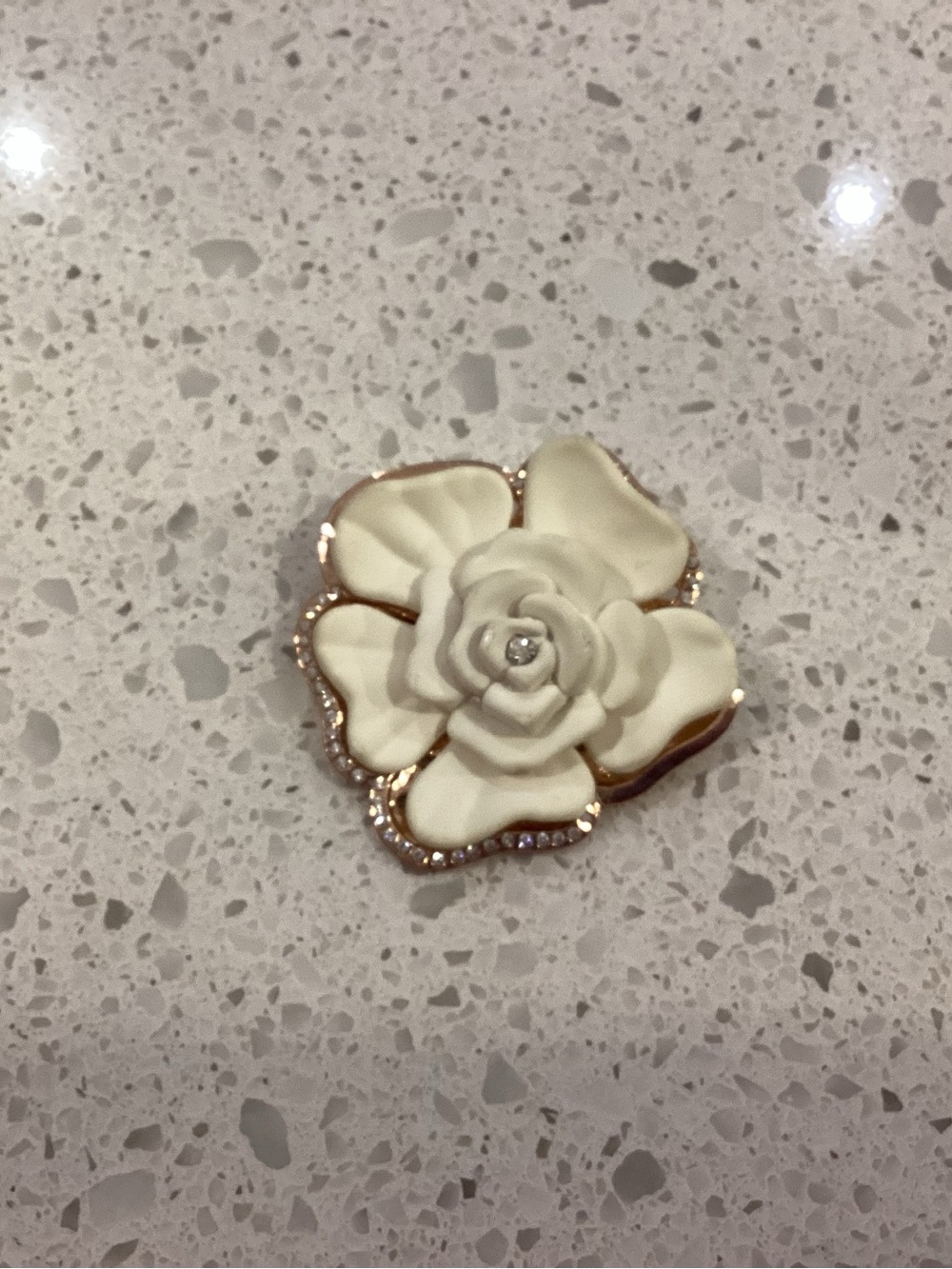 White Floral Resin Brooch with Gold Trim and Crystal Accent